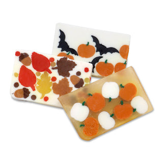 Three soap bars with autumn-themed designs