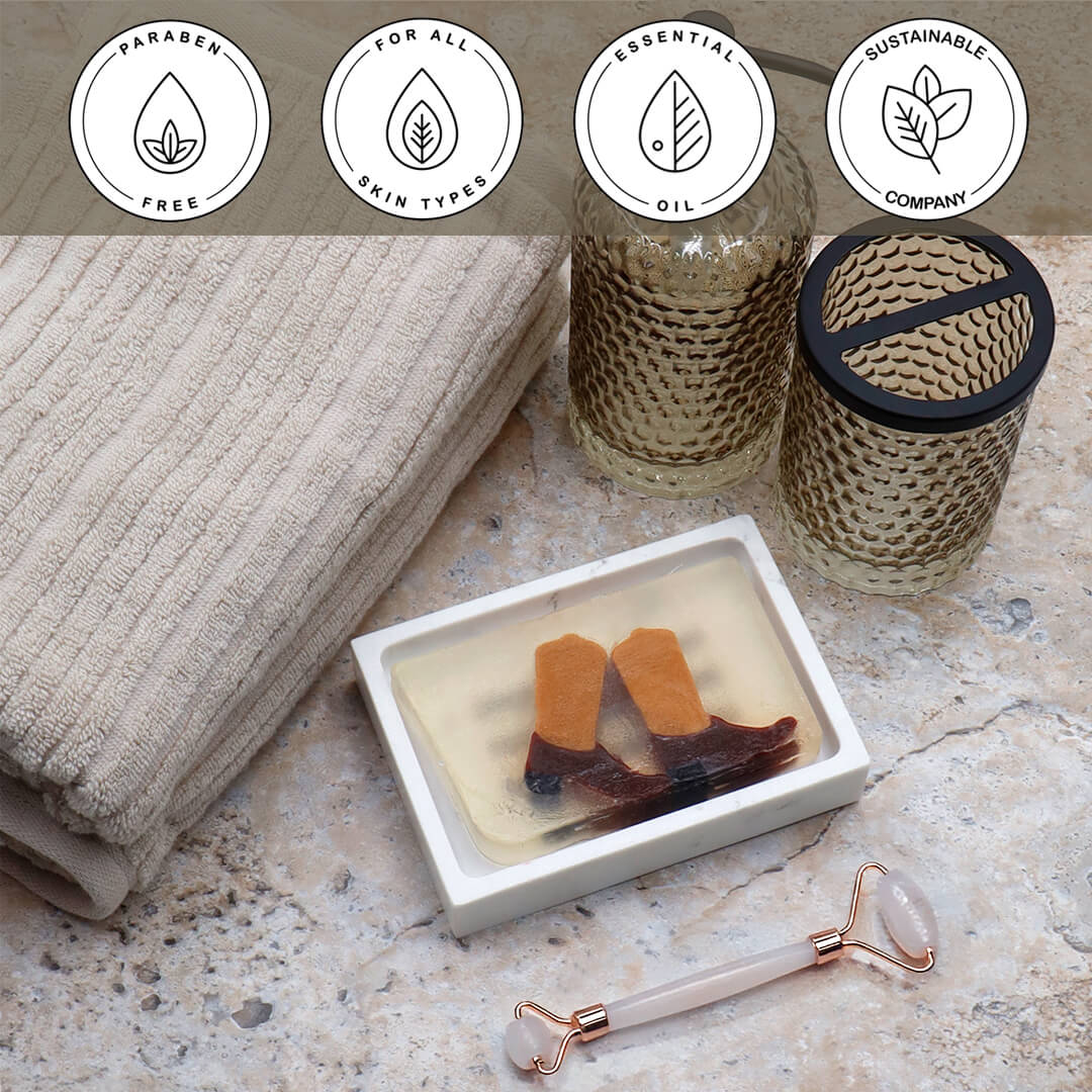 Boots Vegetable Glycerin Bar Soap in a white dish on a stone surface.