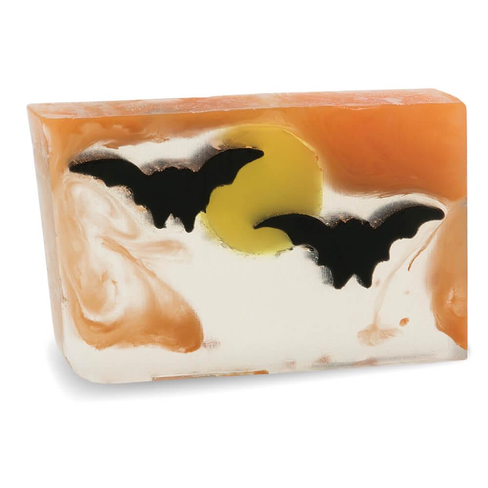Bats glycerin bar soap featuring two black bats across a yellow moon with orange swirls in a translucent rectangular bar.