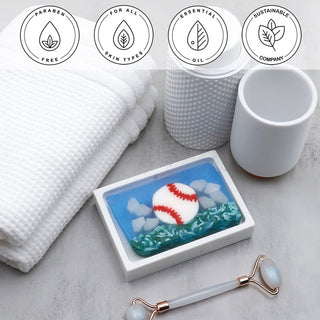 Baseball Vegetable Glycerin Bar Soap in a white dish on a stone surface.