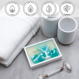 Blue Margarita Vegetable Glycerin Bar Soap in a white dish on a stone surface.