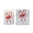 A white candle in a cylindrical glass vessel with a red and white candy cane and red ribbon illustration, shown next to its white marble-patterned box featuring the same design and the text 'ICON CANDLE'.