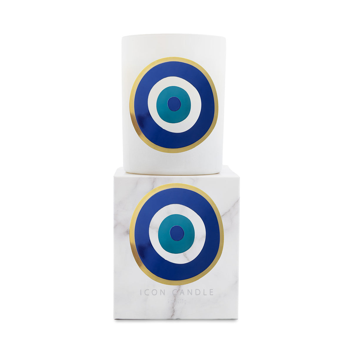 A white cylindrical candle jar stacked on top of its white marble-patterned box, both featuring a blue, teal, and gold concentric eye design. The box has the brand name 'ICON CANDLE' printed on it.