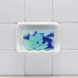 Beach Glass glycerin bar soap with blue, aqua, and pale green sea glass-inspired soap pieces in a translucent rectangular bar.