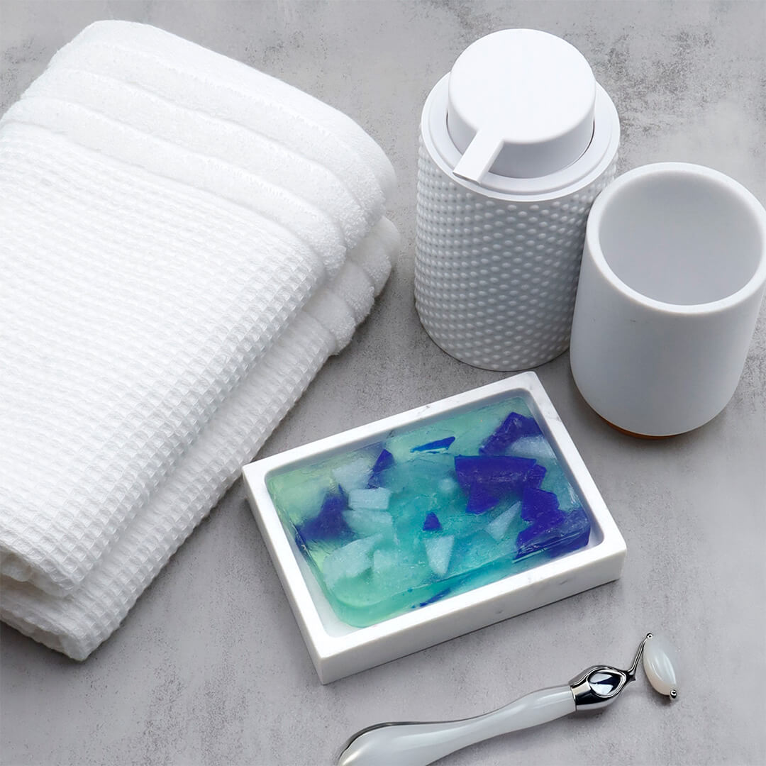 Beach Glass glycerin bar soap with blue, aqua, and pale green sea glass-inspired soap pieces in a translucent rectangular bar.