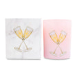 Pink glass candle with champagne glass design and matching box on a white background