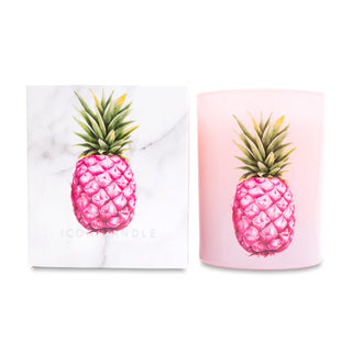 Pink pineapple candle and matching white box on a white background