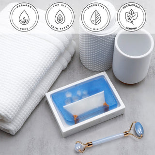 Bubble Bath Vegetable Glycerin Bar Soap in a white dish on a stone surface.