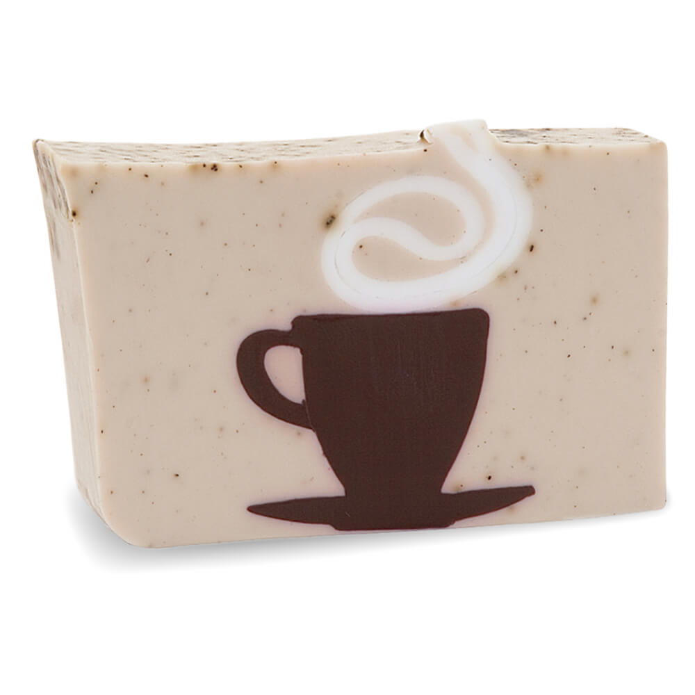 Café Au Lait glycerin bar soap with coffee ground speckles and a brown coffee cup and saucer topped by a white steam swirl.