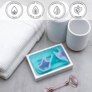 Facets of the Sea Vegetable Glycerin Bar Soap in a white dish on a stone surface.