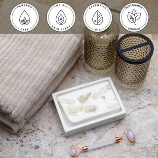 Fiji Coconut Vegetable Glycerin Bar Soap in a white dish on a stone surface.