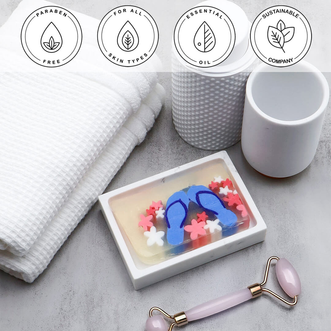 Flip Flops Vegetable Glycerin Bar Soap in a white dish on a stone surface.
