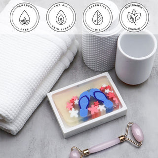 Flip Flops Vegetable Glycerin Bar Soap in a white dish on a stone surface.