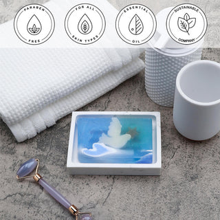Skyward Vegetable Glycerin Bar Soap in a white dish on a stone surface.