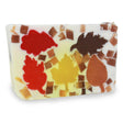 Autumn Leaves glycerin bar soap with red, yellow, amber, and brown leaf shapes surrounded by small autumn-colored soap pieces.